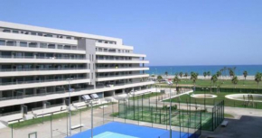 Apartamento Lujo, Primera linea playa, Garaje, Wifi, Piscina climatizada